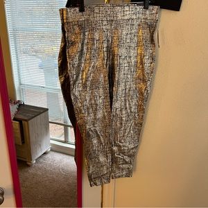 Torrid gold shimmer leggings, size 1. NWT